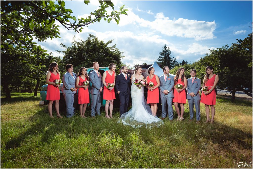 Wedding party laughs by Merridale Cidery